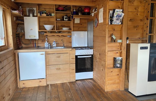 Bellecombe Cabin | Self-contained cabin perched on stilts in the vegetation, Haut Jura, 1250m alt.