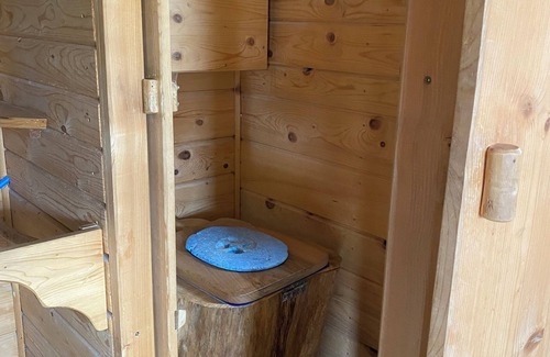 Bellecombe Cabin | Self-contained cabin perched on stilts in the vegetation, Haut Jura, 1250m alt.