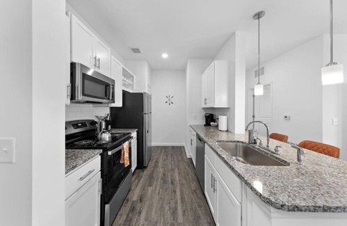 Orange Park Apartment | Serene Haven: Pool & Fitness Escape