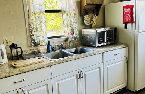 Fish Hawk House | Serene Tiny Home on Farm in Lithia Overlooks Green Space