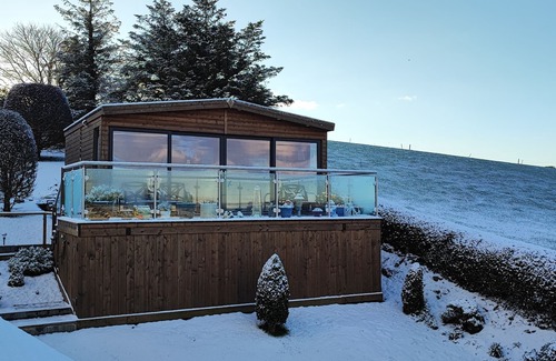 Portaferry Ski Chalet | Set on an elevated private site with commanding views over Strangford Lough.