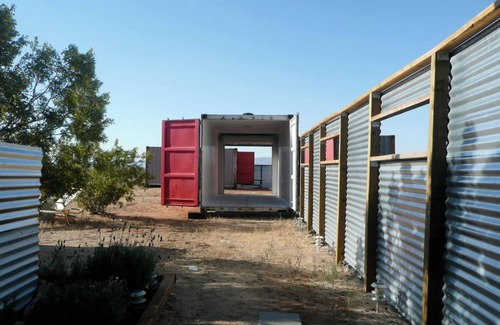Joshua Tree Cabin | “Shangri-La” Mid-Century Mod Cabin with cowboy hot tub and sunset mountain views