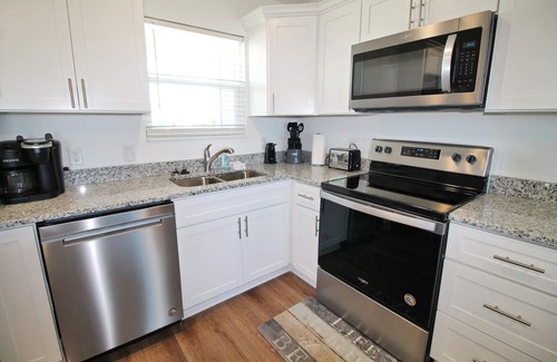 Mexico Beach House | SHORE BEATS WORK IS 500 STEPS TO BEACH! MODERN, IMMACULATE TOWNHOME!