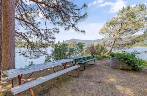 Bass Lake Apartment | Shoreline cabin with lake views & boat slip