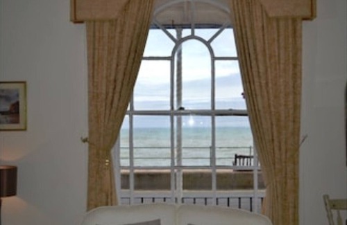 Sidmouth Apartment | Sidmouth seafront apartment, just yards from beach, tastefully furnished.
