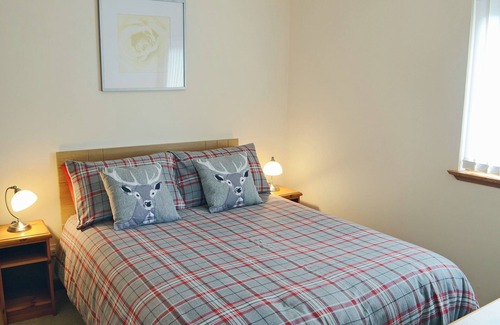 Gairloch Cottage | Single storey detached cottage for couples overlooking Gairloch Bay in Wester Ross .