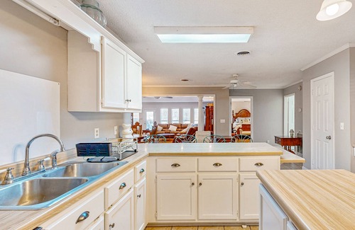 Saltillo House | Single-story home with private deck, grill, fireplace, & W/D