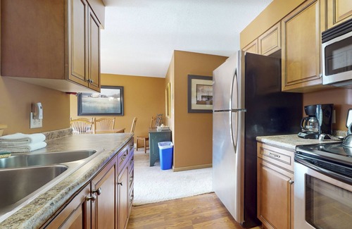 Ludlow Condo | Ski-in/out Condo on Bull Run Trail with fireplace, & full kitchen