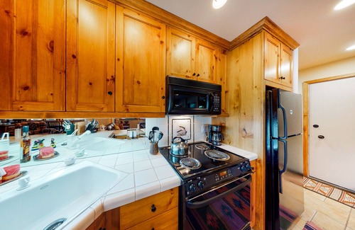 Warm Springs Condo | Ski-in/ski-out condo with pool, mountain view, balcony, & easy trail access