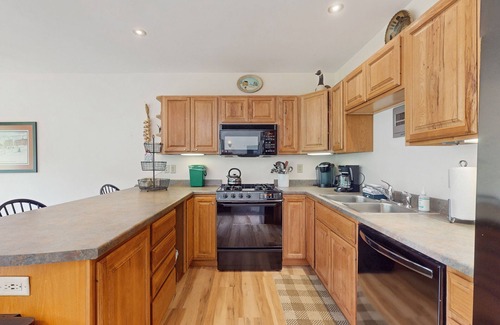 North Troy House | Ski-in/ski-out townhome with great views & deluxe resort amenities