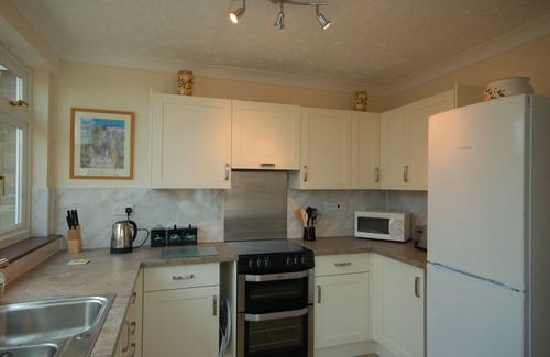 Sheringham Apartment | Sky View - Enjoy panoramic roof top views from the sunny conservatory or outside deck.
