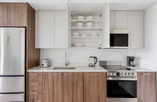 Central Square Apartment | Sleek Central Square 1BR w/Gym, W/D & Roof, near T, by Blueground