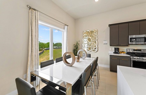 Historic Downtown Kissimmee Condo | Sleek Condo with Pool Table near Disney with Resort & Waterpark Access - B26-208