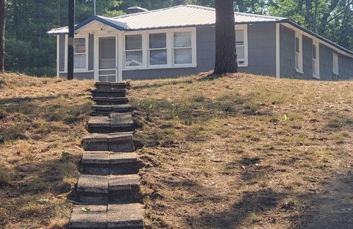 Idlewild Cabin | Sleep 6, Lakeview Cottage with private beach, boat dock & spectacular views.