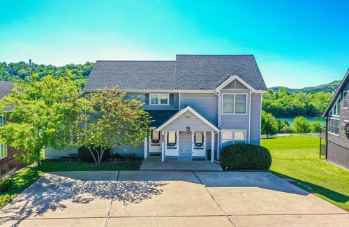 Holiday Island Condo | Sleeps 19 & location can’t be beat! Walk to water & marina.Summer booking fast!