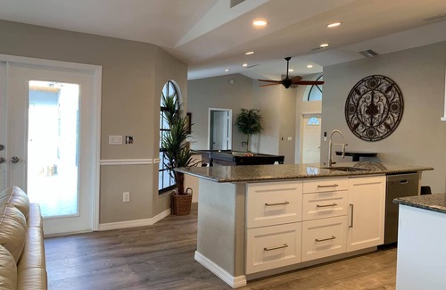 Caloosahatchee House | Sleeps 20! Heated Pool & Spa! Unique huge home Great for large groups! Game room