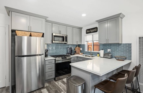 Capistrano Beach House | Sleeps 4 by the beach. Horseshoe and fire pit in private yard.