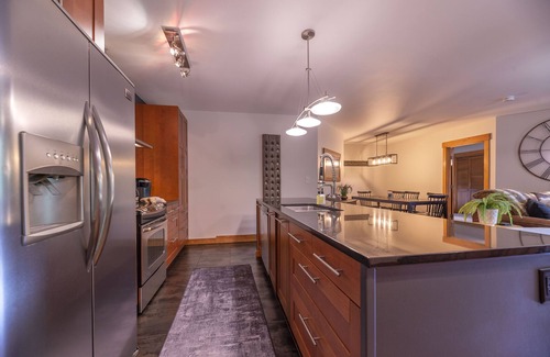 River Run Condo | Slopeside condo near RiverRun gondola,2 hot tubs, Movie lounge, and heated pool