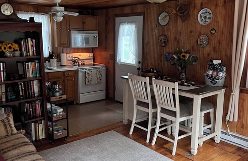 Wakefield-Peacedale Cabin | Small cozy cabin with grill & fire pit close to beaches, skiing, biking and URI.