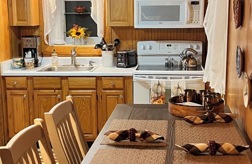 Wakefield-Peacedale Cabin | Small cozy cabin with grill & fire pit close to beaches, skiing, biking and URI.