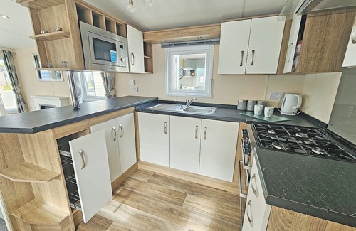Aldbrough House | Smart, modern two bedroom caravan, perfect for couples and families alike.