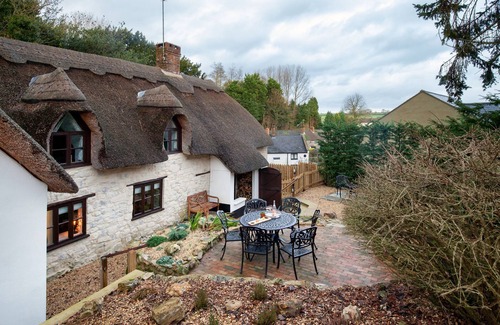 Chard Cottage | Smithycroft is a beautiful thatched and stone detached cottage.