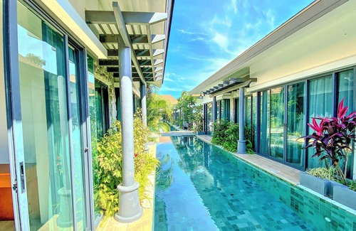Chalong House | Snappy 2 BR Pool Access Suite | Kitchen | Washer