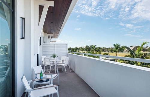 Old Naples Condo | SOCE FLATS 202 - Luxury Two Bedroom with Wraparound Balcony!