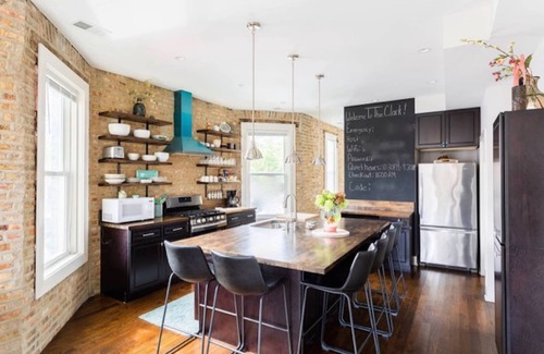 Rogers Park Condo | Soft Leather and Warm Bricks at a Stylish Rogers Park Home