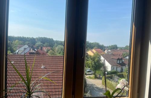Feucht House | Sonniges Dachzimmer