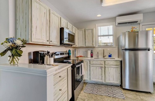 Fernandina Beach Condo | South Beach Cabana Down | Patio | Pool | Across Street from Beach