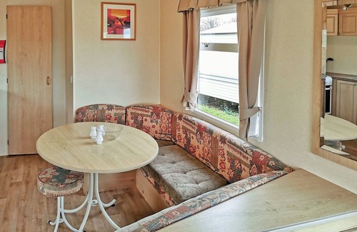 Aberystwyth House | Spacious 12ft-wide caravan with one double and one twin.