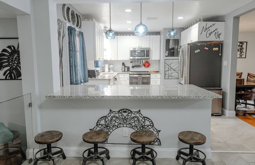 Colonialtown North House | Spacious 3BR Pool House on Mills 50 · Central, Walkable, Perfect for Long Stays