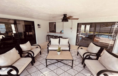 Biggar House | Spacious 4-bedroom house with heated pool great for large groups.