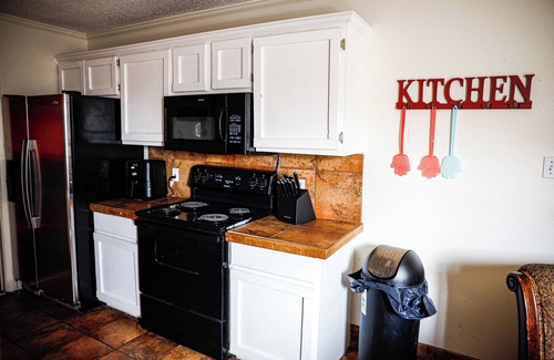 Southgate House | Spacious 4-bedroom Red Raider themed house with AC and WiFi in fantastic Lubbock