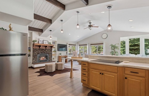 Lakeside House | Spacious 7-Bed Home w/Hot Tub, Fireplace, Gym, Wine Bar, and 2 Living Spaces!