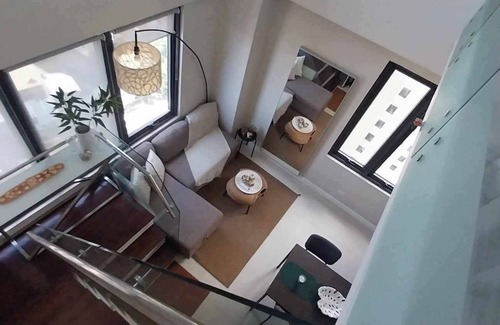 Capitol Site Condo | Spacious and Airy Loft with Stunning Cityscape