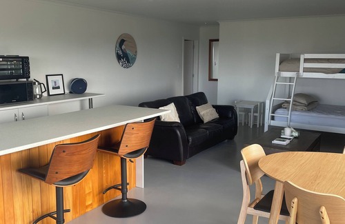 Solway Apartment | Spacious and inviting 1 bedroom unit with amazing sunrise views.