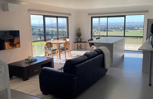 Solway Apartment | Spacious and inviting 1 bedroom unit with amazing sunrise views.