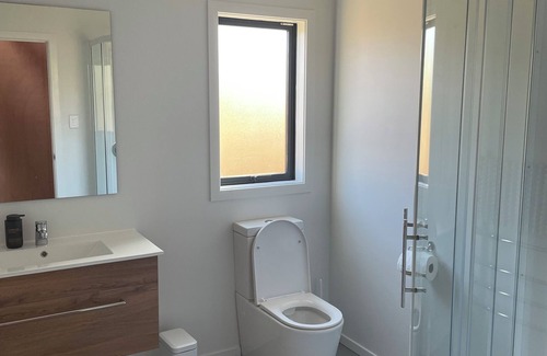 Solway Apartment | Spacious and inviting 1 bedroom unit with amazing sunrise views.