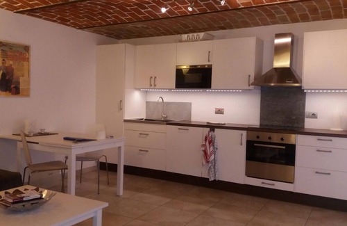 Castiglione Tinella Apartment | Spacious apartment in beautifully renovated property with shared pool and garden