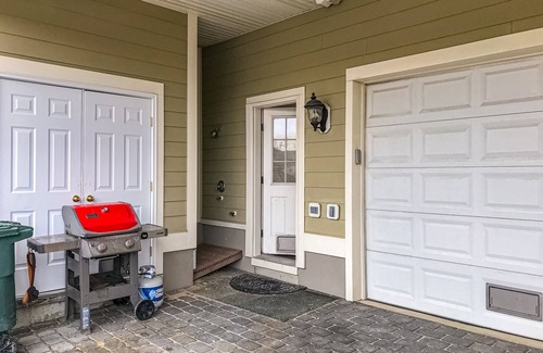 Sunset Island House | Spacious beachside home with fireplace, washer/dryer, pools, dock, & gym