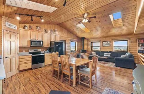 Yellowstone County Cabin | Spacious cabin with incredible views, hot tub, wood fireplace, and Wi-Fi
