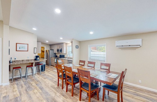 Coos Bay House | Spacious coastal property with separate living quarters, wood stove, & grill