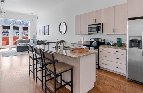 East Market District Condo | Spacious Condo in Center of NULU with Free, Gated, Secure Parking and Entrance