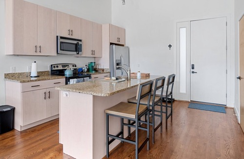 East Market District Condo | Spacious Condo in Center of NULU with Free, Gated, Secure Parking and Entrance