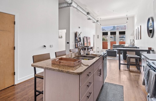 East Market District Condo | Spacious Condo in Center of NULU with Free, Gated, Secure Parking and Entrance