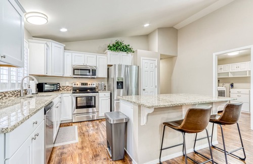 Three Rivers House | Spacious home with new hot tub, enclosed backyard, EV charger & fireplace
