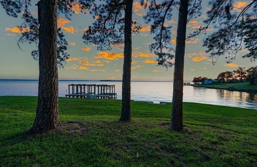 West Livingston House | Spacious Lakefront Getaway: Pet-Friendly Retreat w/Dock and Stunning Lake Views