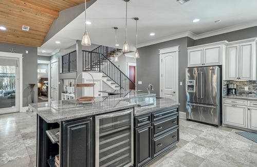 Sugarwood Beach House | Spacious Layout with Heated Pool, Fire Pit, Golf Cart, Bikes, and Carriage House